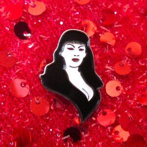 Tura Satana lapel pin enamel jewelry